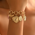 Gold Heart and Bow Charm Bracelet