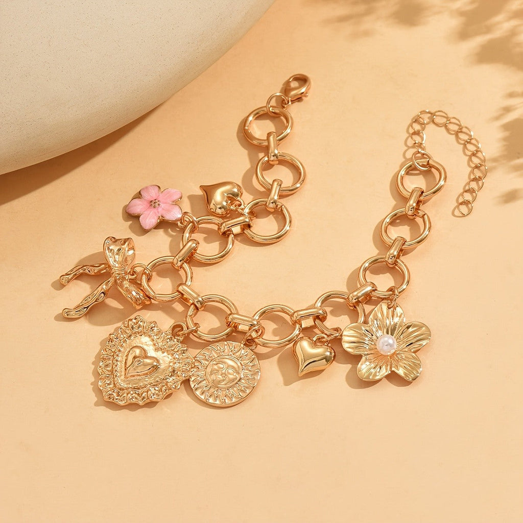 Gold Heart and Bow Charm Bracelet