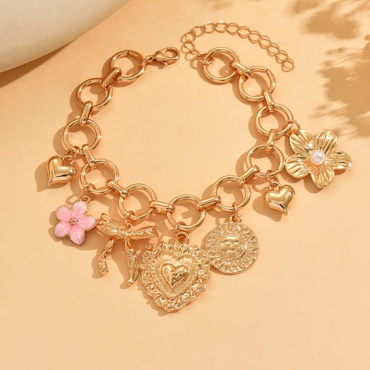 Gold Heart and Bow Charm Bracelet