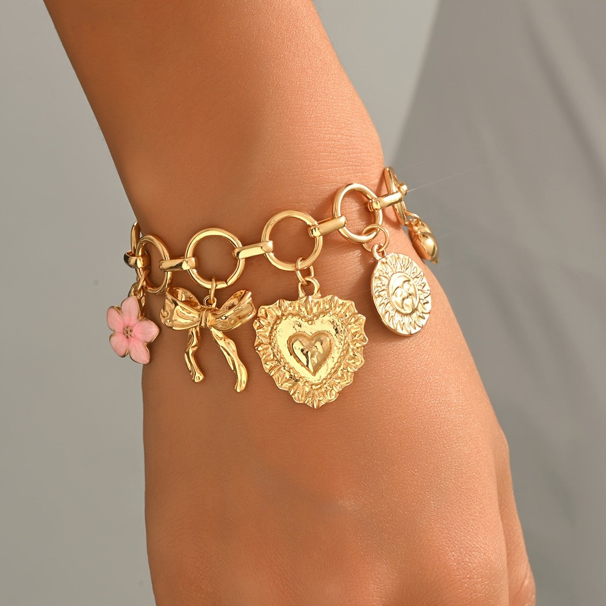 Gold Heart and Bow Charm Bracelet