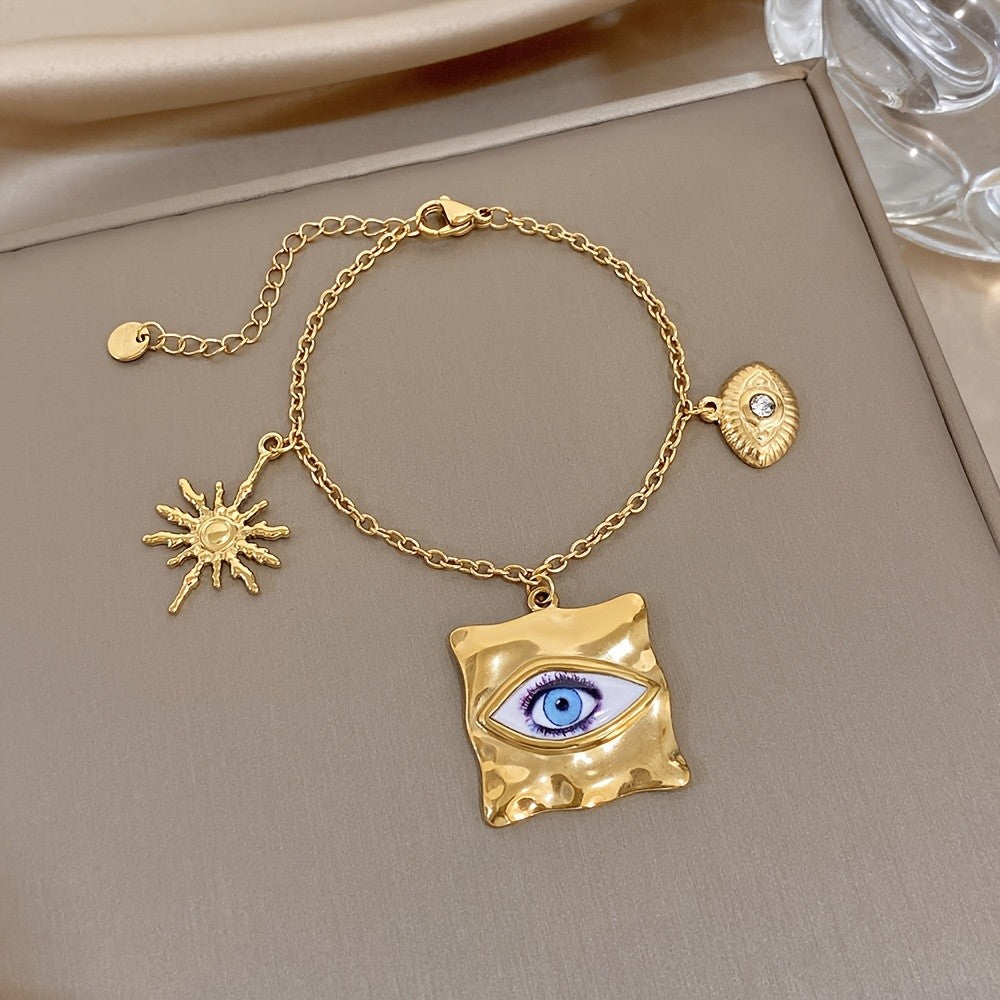 18k Eye Sun Charm Bracelet