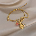18k Layered Heart Charm Bracelet