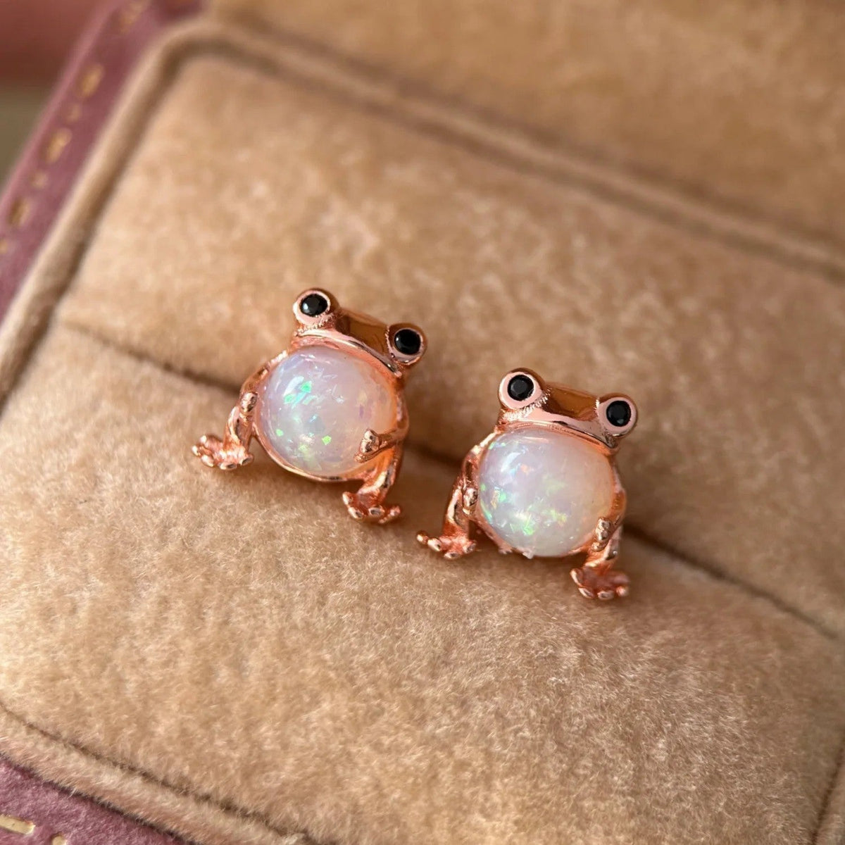 CK Penguin Opal Stud Earrings